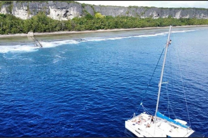 a small boat in a body of water