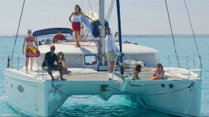 a group of people on a boat in the water