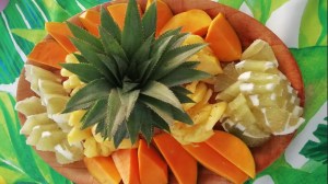 a plate of food with a green plant