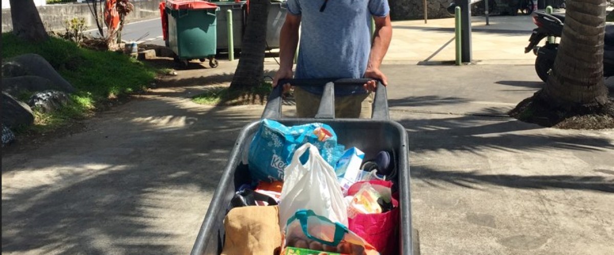 a person riding a skateboard up the side of a road