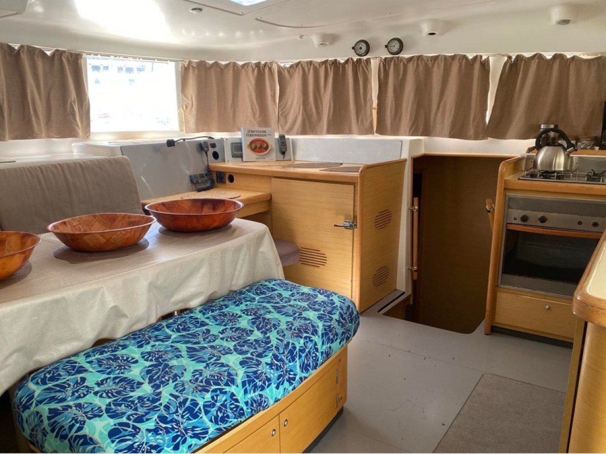 a bedroom with a bed and desk in a room