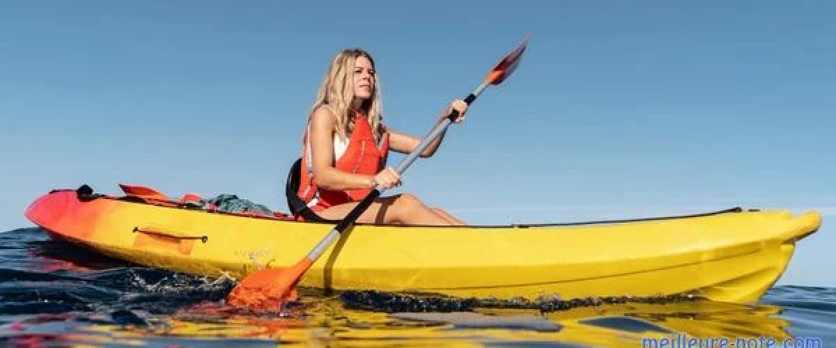a person sitting on a boat in the water